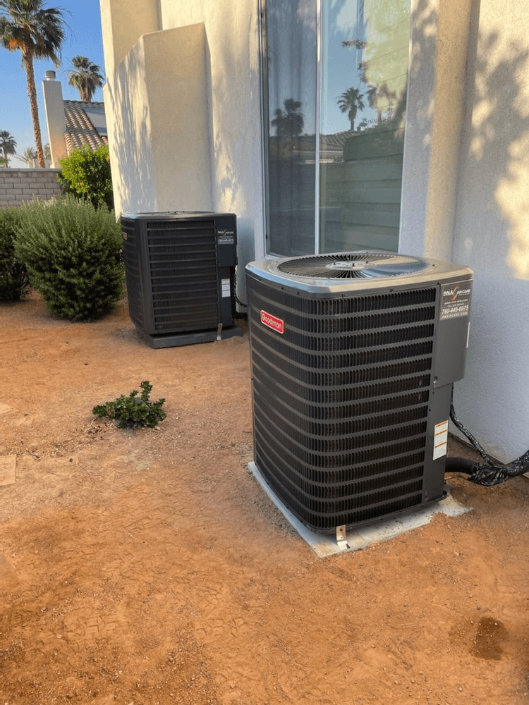 HVAC technician inspecting a residential HVAC system in a Coachella Valley home to prevent costly breakdowns.